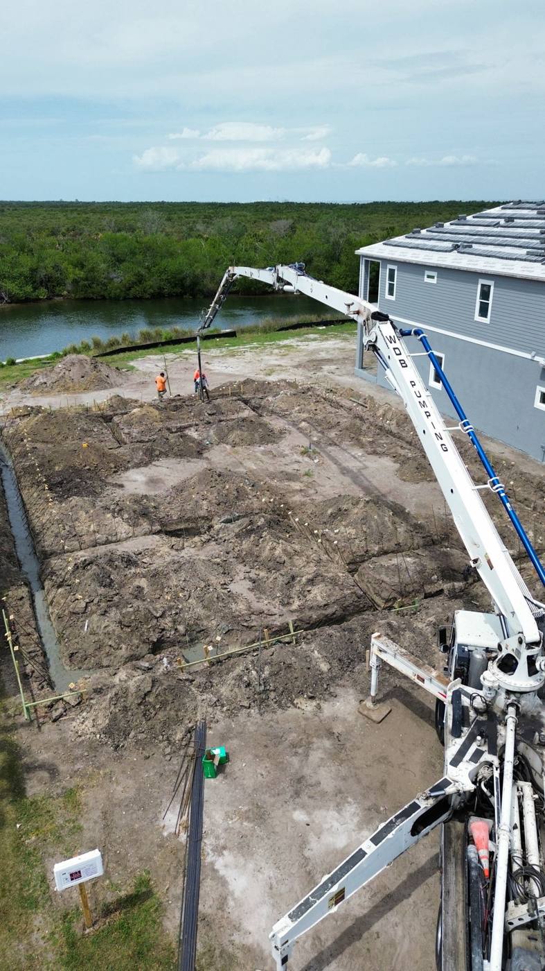 View down a WDB boom pouring footings